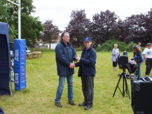 Collecting the award from Richard
